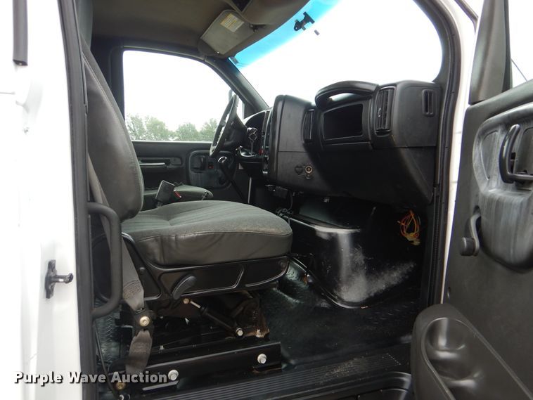 image for item GM9106 2004 GMC C7500  Crew Cab flat dump bed truck