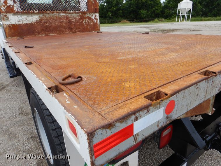 image for item GM9106 2004 GMC C7500  Crew Cab flat dump bed truck