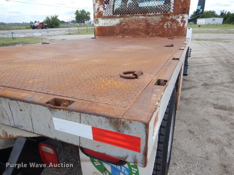 image for item GM9106 2004 GMC C7500  Crew Cab flat dump bed truck