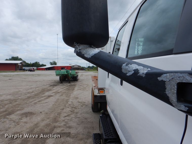 image for item GM9106 2004 GMC C7500  Crew Cab flat dump bed truck