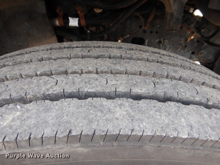 image for item GM9106 2004 GMC C7500  Crew Cab flat dump bed truck