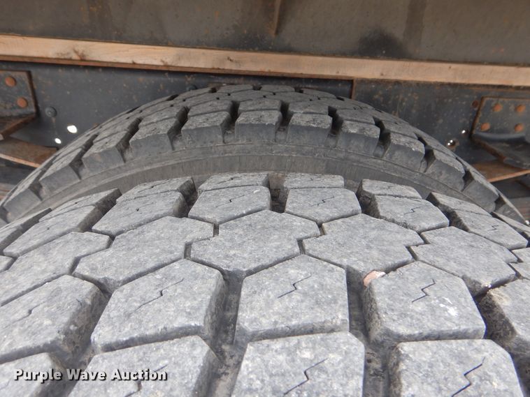 image for item GM9106 2004 GMC C7500  Crew Cab flat dump bed truck