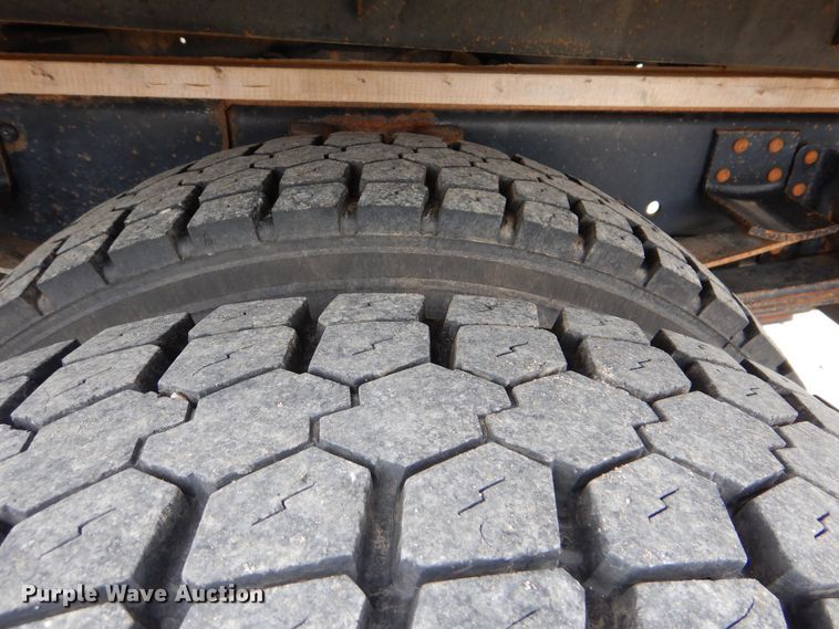 image for item GM9106 2004 GMC C7500  Crew Cab flat dump bed truck