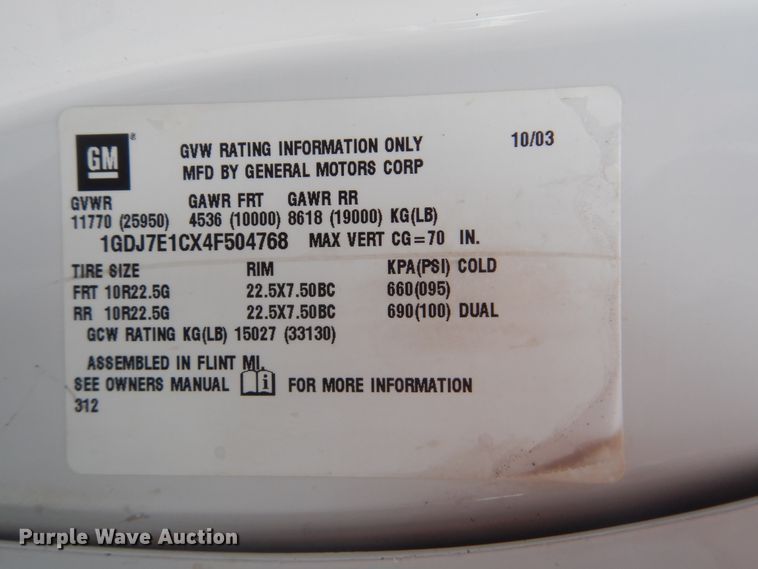 image for item GM9106 2004 GMC C7500  Crew Cab flat dump bed truck