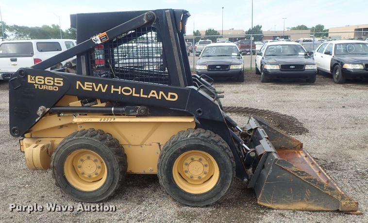 image for item DI4561 1999 New Holland LX665  skid steer loader