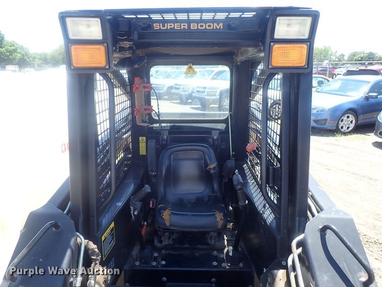 image for item DI4561 1999 New Holland LX665  skid steer loader