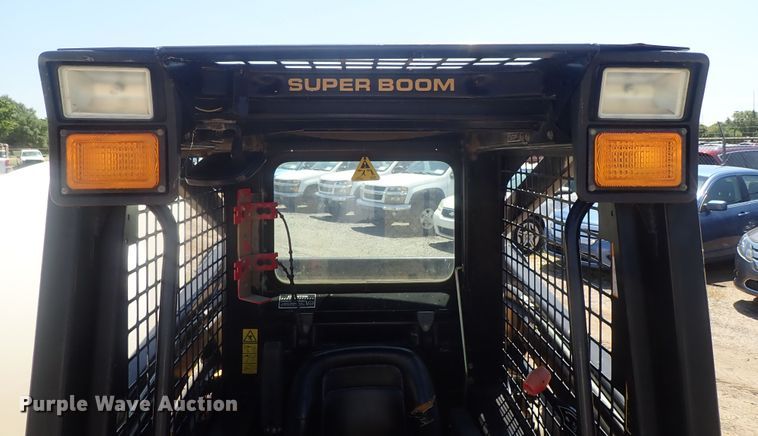 image for item DI4561 1999 New Holland LX665  skid steer loader