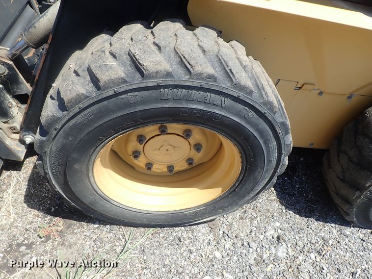 image for item DI4561 1999 New Holland LX665  skid steer loader