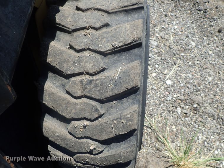 image for item DI4561 1999 New Holland LX665  skid steer loader