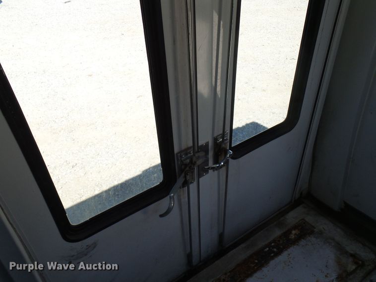 image for item DG2063 2009 Ford E350 Super Duty  shuttle bus