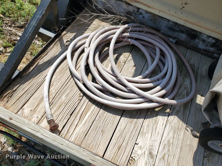 image for item DD0376 2000 Big Tex utility trailer with soda blast machine