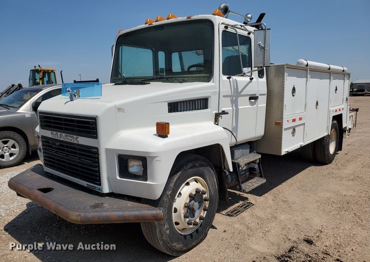image for item DD0381 2001 Mack CS  service truck with crane