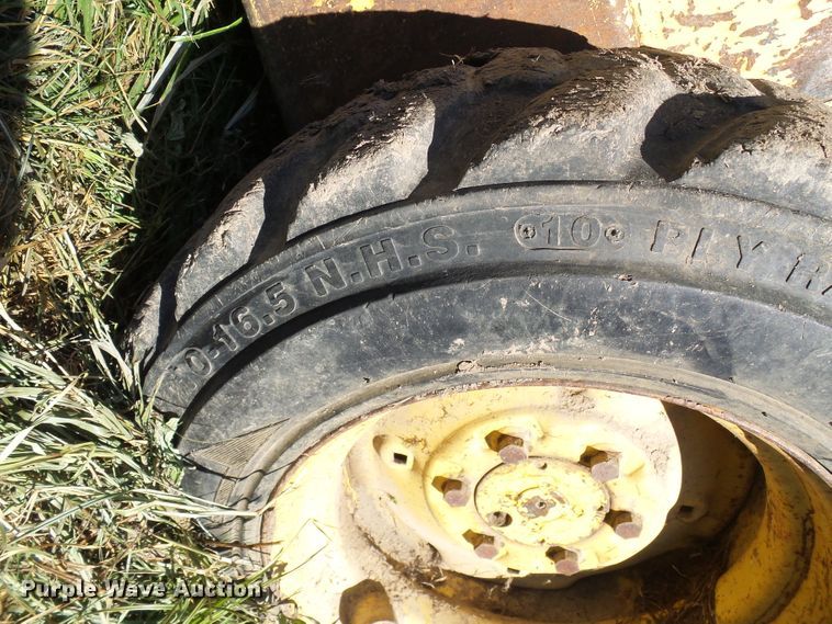 image for item DG2054 1987 New Holland L555  skid steer loader