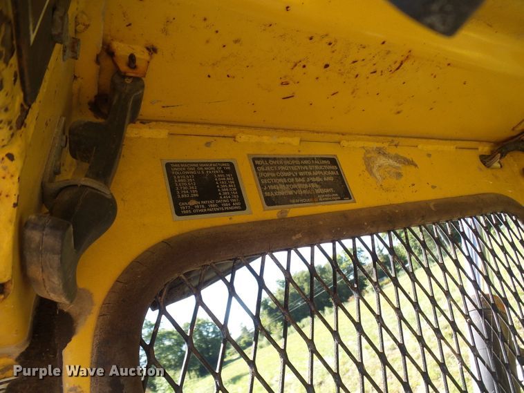 image for item DG2054 1987 New Holland L555  skid steer loader