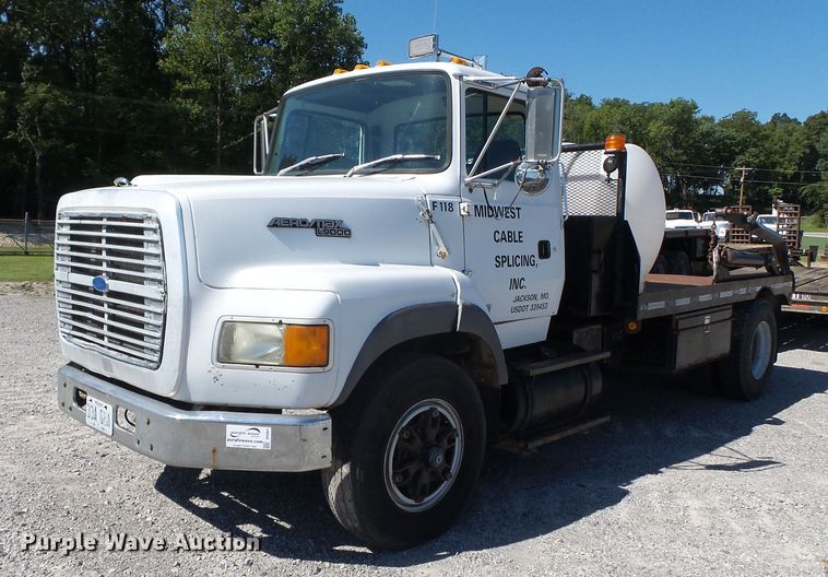 image for item DH3841 1992 Ford L9000  flatbed truck