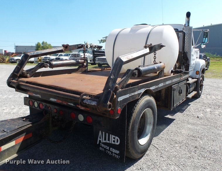 image for item DH3841 1992 Ford L9000  flatbed truck