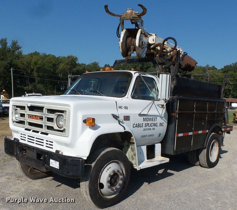 image for item DH3881 1987 GMC C7000  digger derrick truck