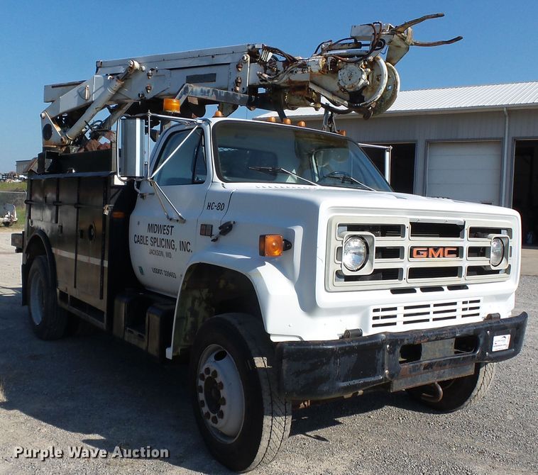 image for item DH3881 1987 GMC C7000  digger derrick truck