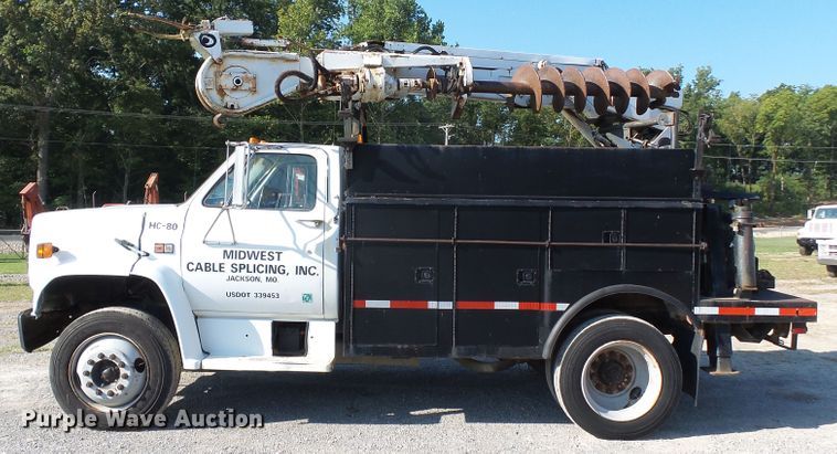 image for item DH3881 1987 GMC C7000  digger derrick truck