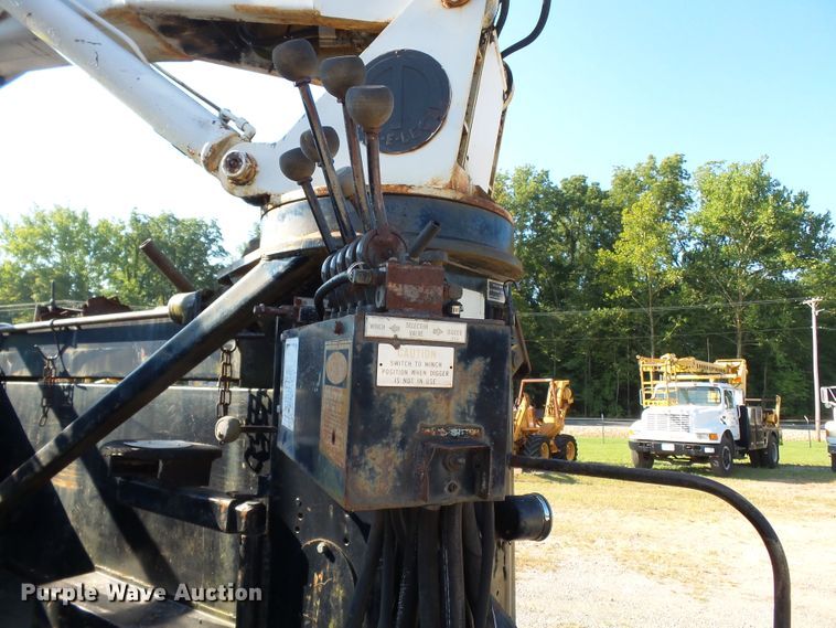 image for item DH3881 1987 GMC C7000  digger derrick truck