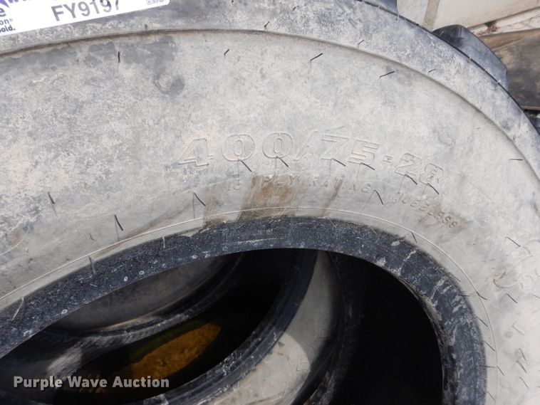 4) Firestone 400/75-28 tires in Manhattan, KS | Item FY9197 sold | Purple  Wave