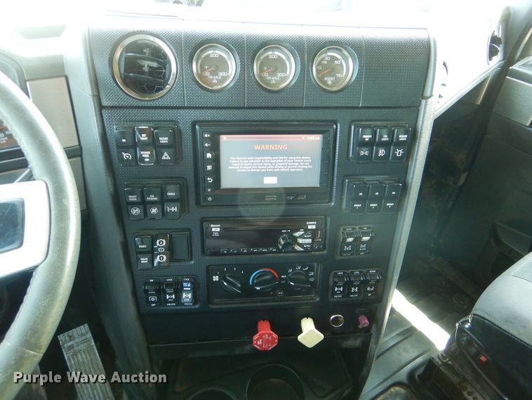 image for item GM9125 2014 Caterpillar CT660  vacuum truck