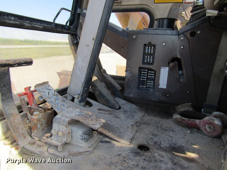 image for item GQ9085 1994 John Deere 595D  rubber tire excavator