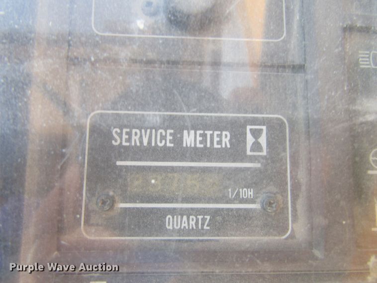 image for item GQ9085 1994 John Deere 595D  rubber tire excavator