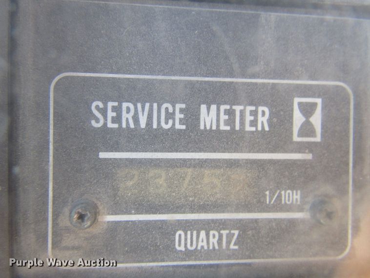 image for item GQ9085 1994 John Deere 595D  rubber tire excavator