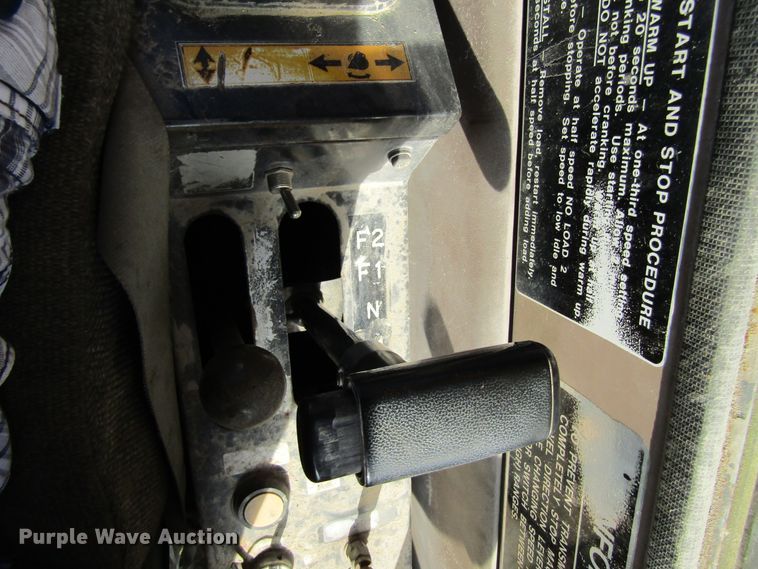 image for item GQ9085 1994 John Deere 595D  rubber tire excavator