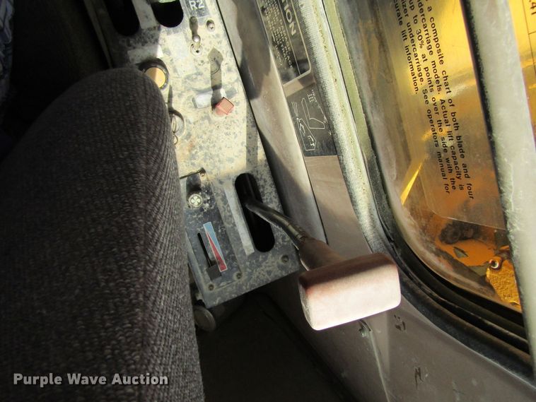 image for item GQ9085 1994 John Deere 595D  rubber tire excavator