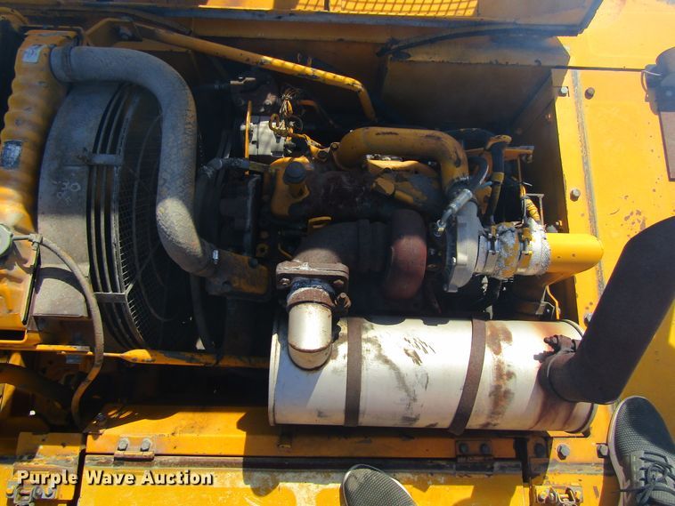 image for item GQ9085 1994 John Deere 595D  rubber tire excavator