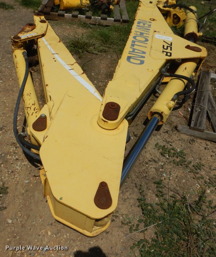 New Holland 75B backhoe arm in Ada, OK Item HY9291 sold Purple Wave
