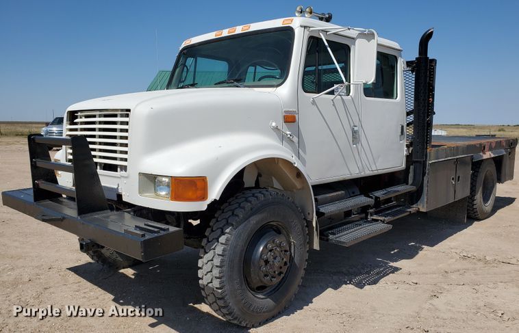 image for item DF5706 1997 International 4800  Crew Cab flatbed truck