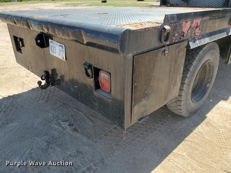 image for item DF5706 1997 International 4800  Crew Cab flatbed truck