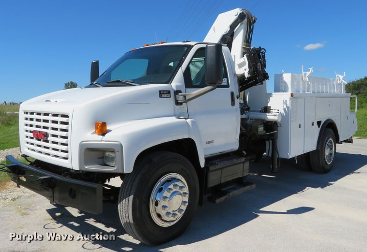 image for item DH1149 2006 GMC C8500  flatbed truck with crane