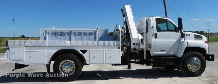 image for item DH1149 2006 GMC C8500  flatbed truck with crane