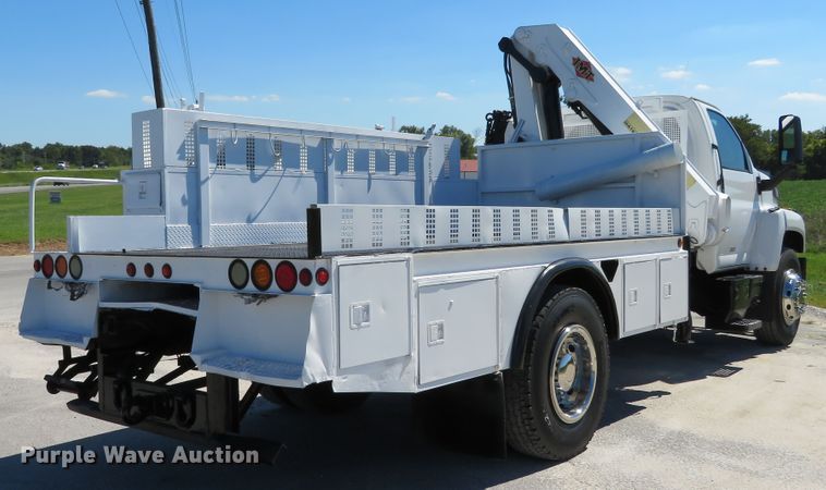 image for item DH1149 2006 GMC C8500  flatbed truck with crane