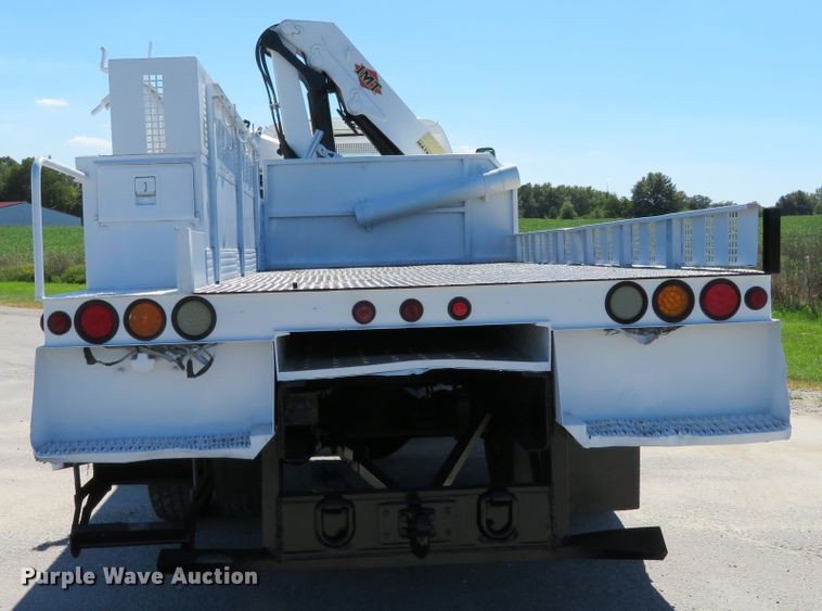 image for item DH1149 2006 GMC C8500  flatbed truck with crane
