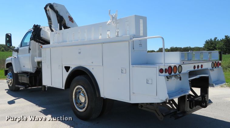 image for item DH1149 2006 GMC C8500  flatbed truck with crane