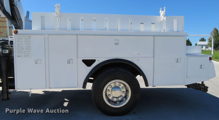 image for item DH1149 2006 GMC C8500  flatbed truck with crane