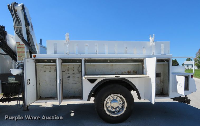 image for item DH1149 2006 GMC C8500  flatbed truck with crane