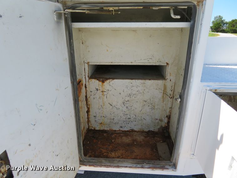 image for item DH1149 2006 GMC C8500  flatbed truck with crane