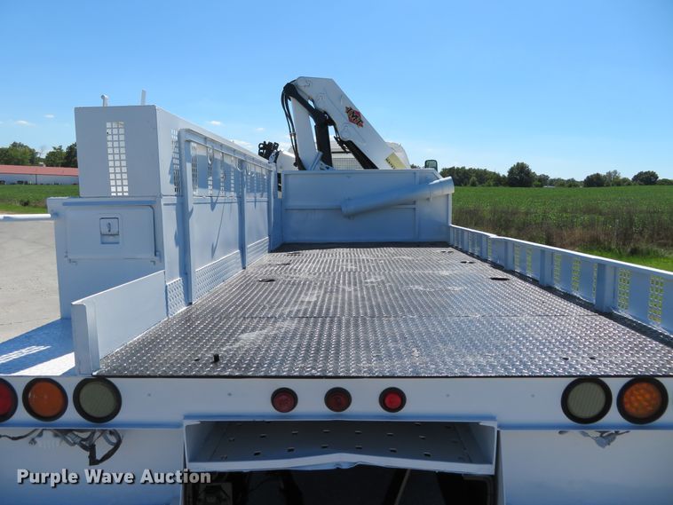 image for item DH1149 2006 GMC C8500  flatbed truck with crane