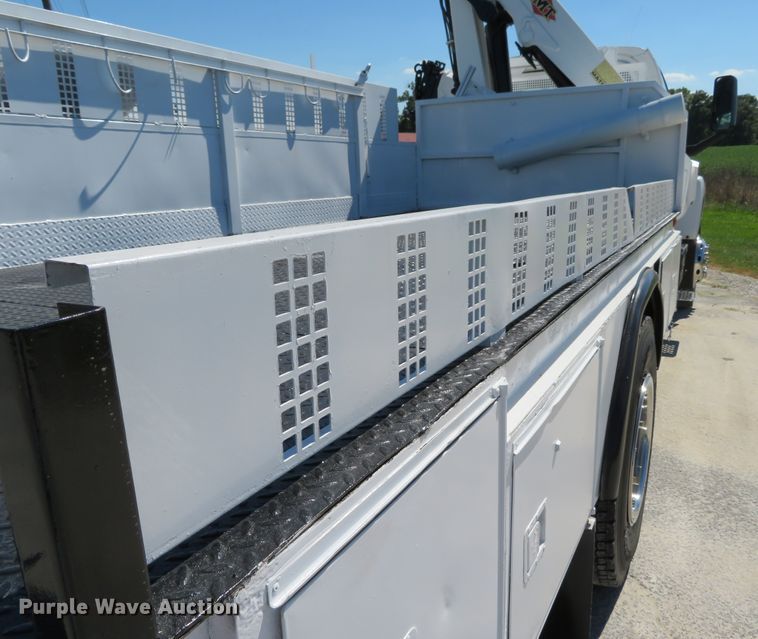 image for item DH1149 2006 GMC C8500  flatbed truck with crane