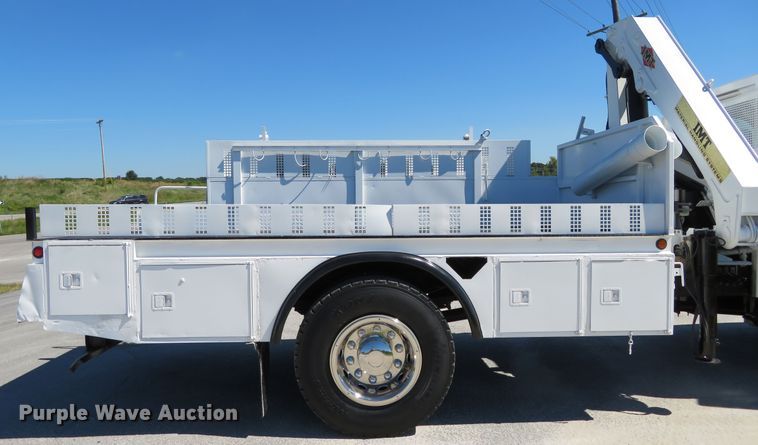 image for item DH1149 2006 GMC C8500  flatbed truck with crane