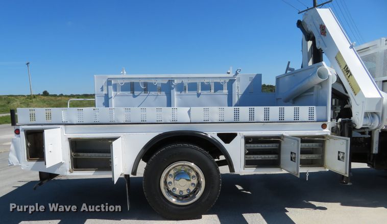 image for item DH1149 2006 GMC C8500  flatbed truck with crane