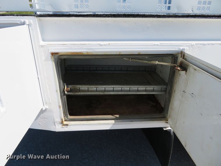 image for item DH1149 2006 GMC C8500  flatbed truck with crane