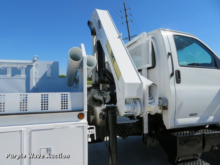 image for item DH1149 2006 GMC C8500  flatbed truck with crane
