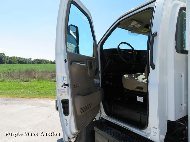 image for item DH1149 2006 GMC C8500  flatbed truck with crane